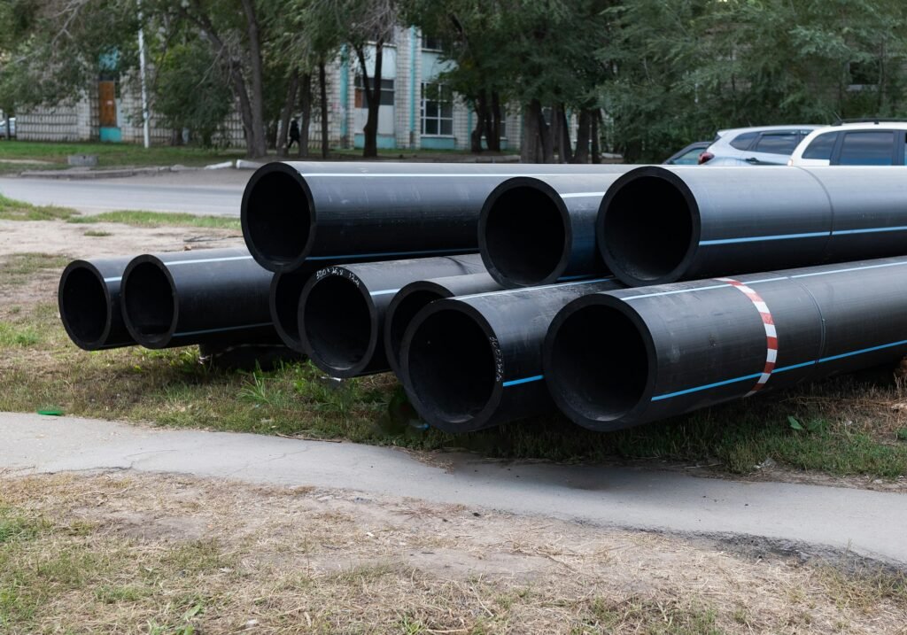 Replacement of sewer pipes. New pipes close-up.